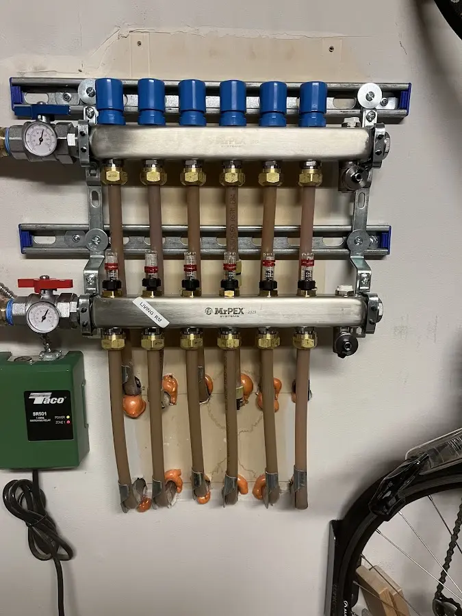 Plumber performing Water Heater Repair at a residential property in San Martin